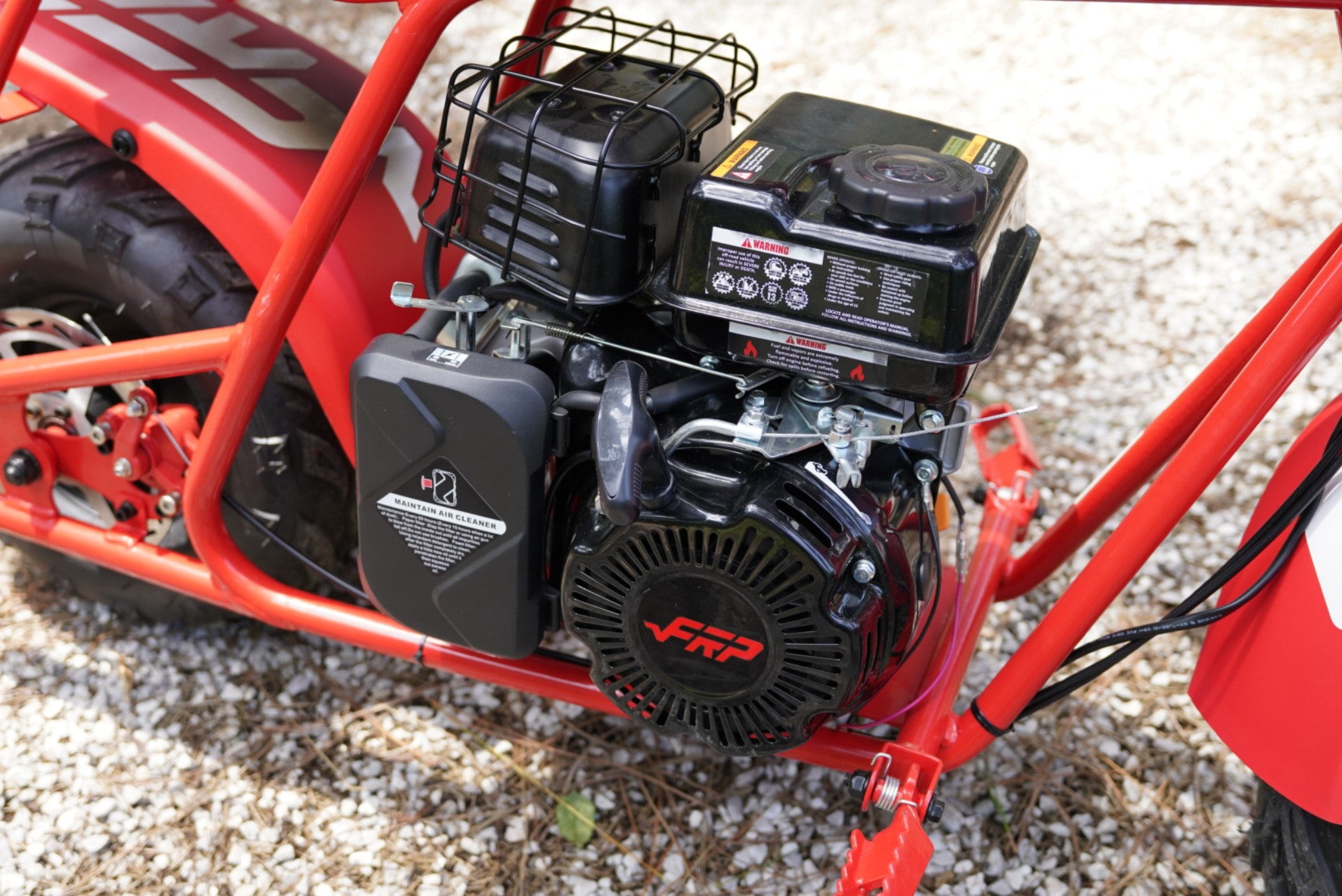 The engine of the GMB100 gas mini bike.