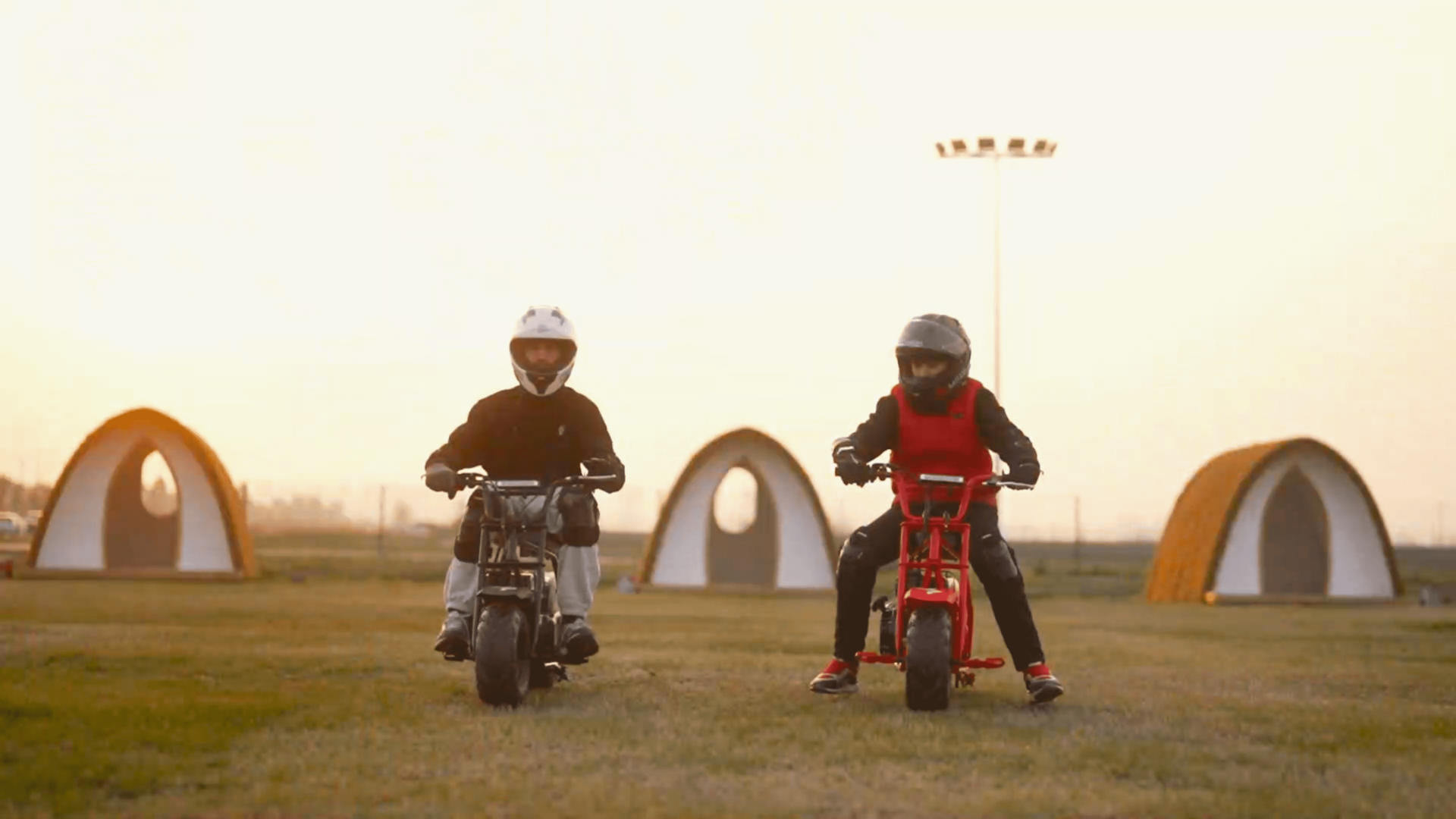 FRP mini bikes are ridden by 2 kids.