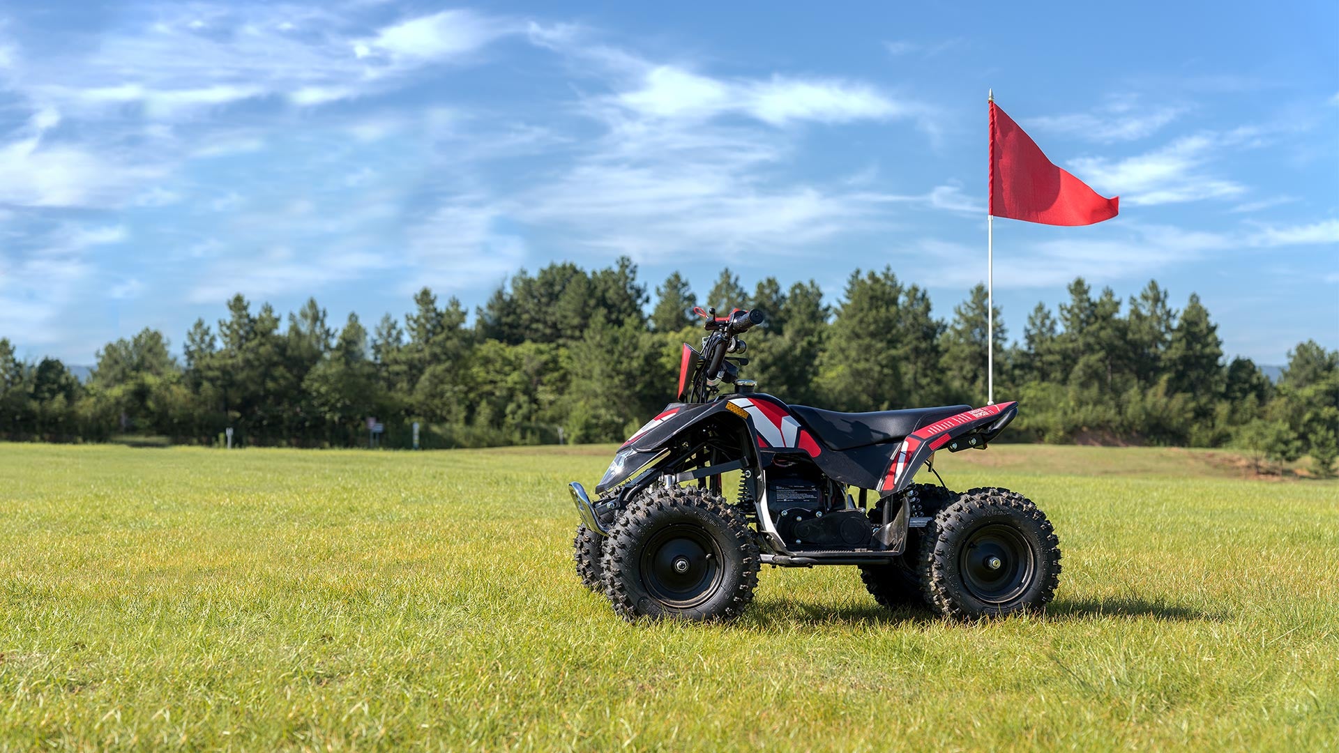 A FRP Sahara 40 gas mini quad on the grassland.