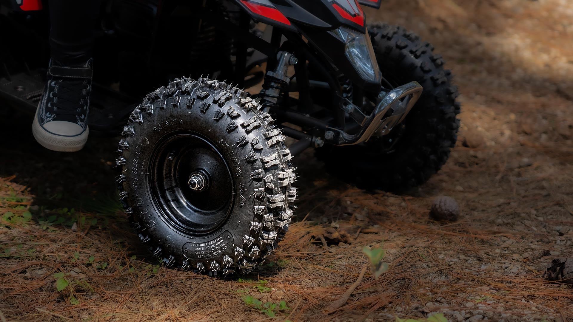 A Sahara 40 gas mini quad is on the dirt